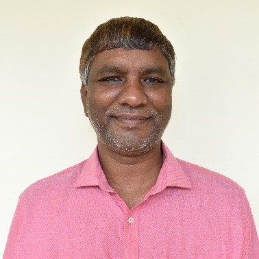Dr. Purusothama P